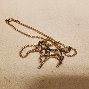 ✴ 2/$20 Gold tone Avon unicorn necklace